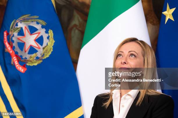 Italy's new Prime Minister Giorgia Meloni looks up during a handover ceremony with outgoing Prime Minister Mario Draghi, at Chigi Palace, on October...