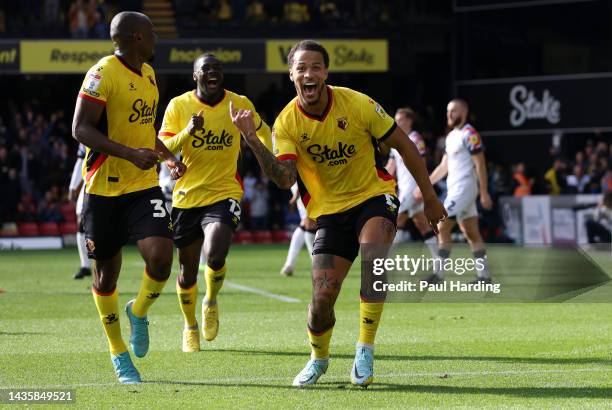 William Troost-Ekong of Watford celebrates after scoring their team's second goal during the Sky Bet Championship match between Watford and Luton...