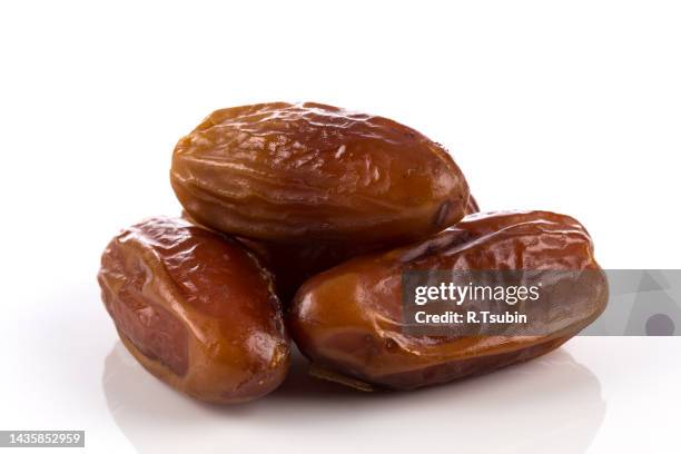 date fruit sweet close up isolated on a white background - date fruit stock pictures, royalty-free photos & images