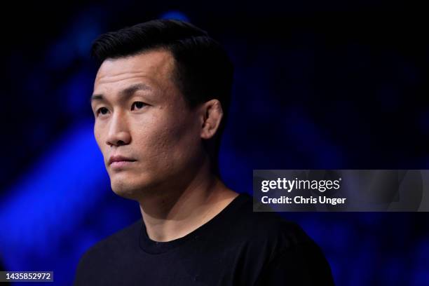The Korean Zombie' Chan Sung Jung is seen in the corner of SeungGuk Choi of South Korea before his flyweight fight against Qiu Lun of China during...