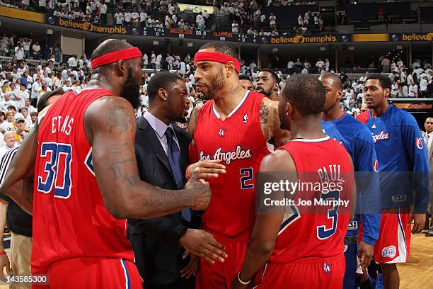 Reggie Evans, Kenyon Martin, and Chris Paul of the Los Angeles Clippers congratulate one another after defeating the Memphis Grizzlies 99-98 in Game...