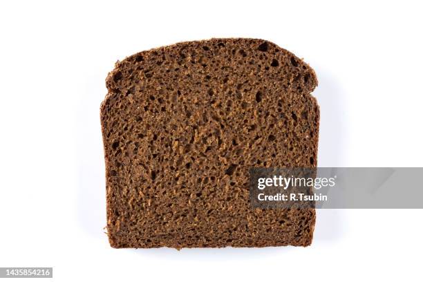 rye black bread slices isolated on white background - loaf of bread stock pictures, royalty-free photos & images