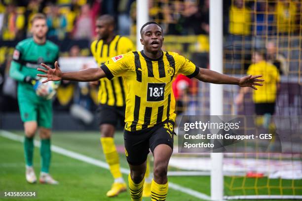 Youssoufa Moukoko of Borussia Dortmund celebrates after scoring his team's fifth goal during the Bundesliga match between Borussia Dortmund and VfB...