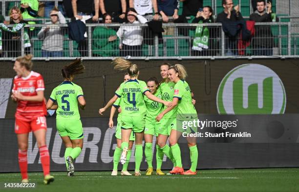 The players of Wolfsburg celebrate the first goal during the FLYERALARM Women's Bundesliga match between VfL Wolfsburg and Bayern München at...