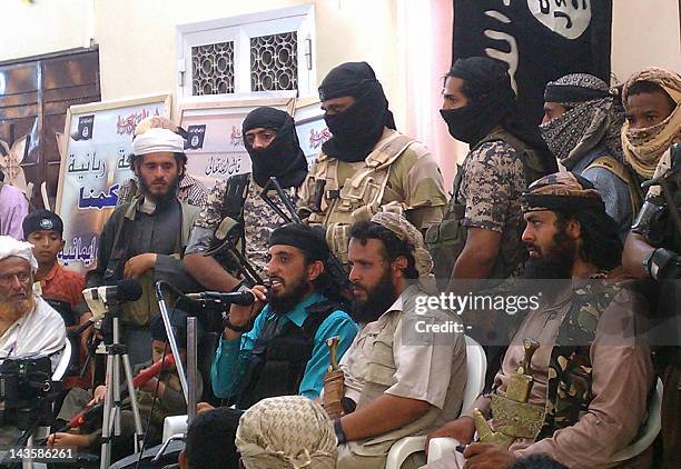 Jalal al-Blaidy, also known as Abu Hamza, leader of the Ansar al-Sharia in Yemen, addresses tens of Yemeni soldiers upon their release in the...