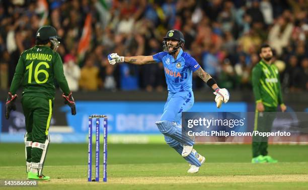 Virat Kohli celebrates after India won the ICC Men's T20 World Cup match between India and Pakistan at Melbourne Cricket Ground on October 23, 2022...