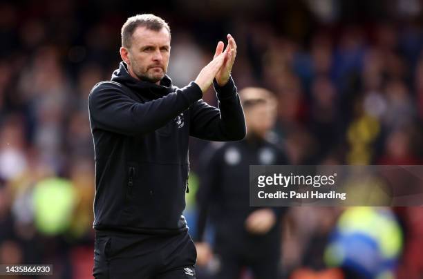 Nathan Jones, manager of Luton Town applauds the fans after the Sky Bet Championship match between Watford and Luton Town at Vicarage Road on October...