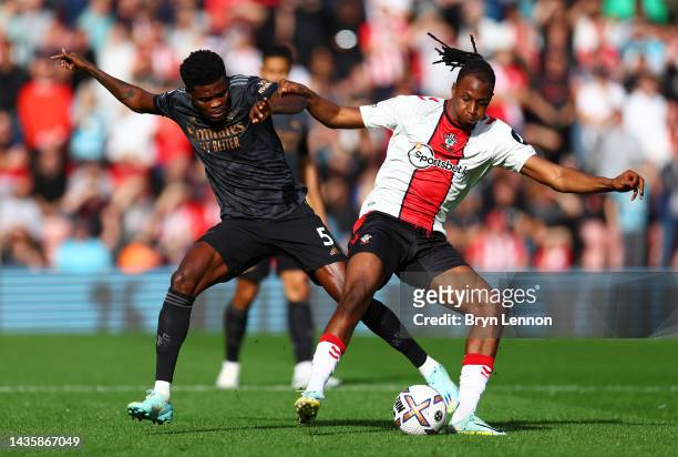 Thomas Partey of Arsenal battles for possession with Joe Aribo of Southampton during the Premier League match between Southampton FC and Arsenal FC...