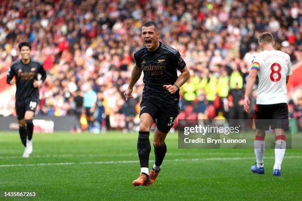 Granit Xhaka of Arsenal celebrates after scoring their team's first goal during the Premier League match between Southampton FC and Arsenal FC at...