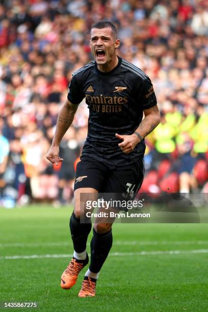 Granit Xhaka of Arsenal celebrates after scoring their team's first goal during the Premier League match between Southampton FC and Arsenal FC at...