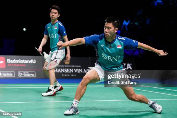 Marcus Fernaldi Gideon and Kevin Sanjaya Sukamuljo of Indonesia compete in the Men's Double Final match against Fajar Alfian and Muhammad Rian...