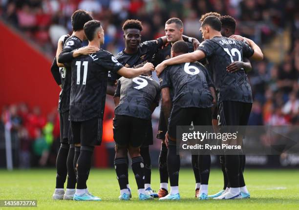 Arsenal players enter a huddle prior to during the Premier League match between Southampton FC and Arsenal FC at Friends Provident St. Mary's Stadium...