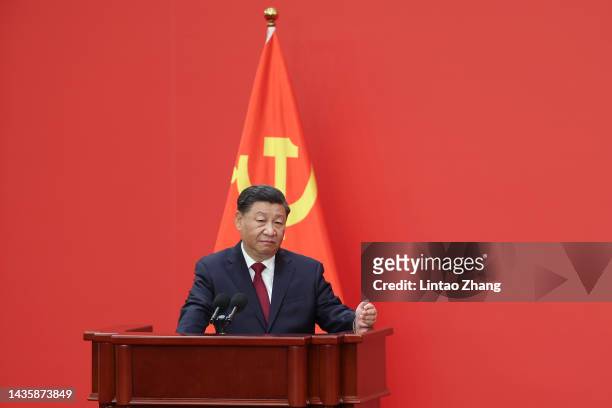 Chinese President Xi Jinping speaks at the podium during the meeting between members of the standing committee of the Political Bureau of the 20th...