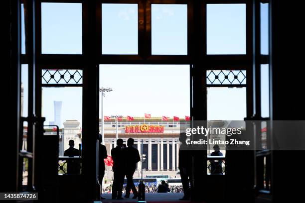 Member of security staff gestures inside the Great Hall of the People after during the meeting between members of the standing committee of the...