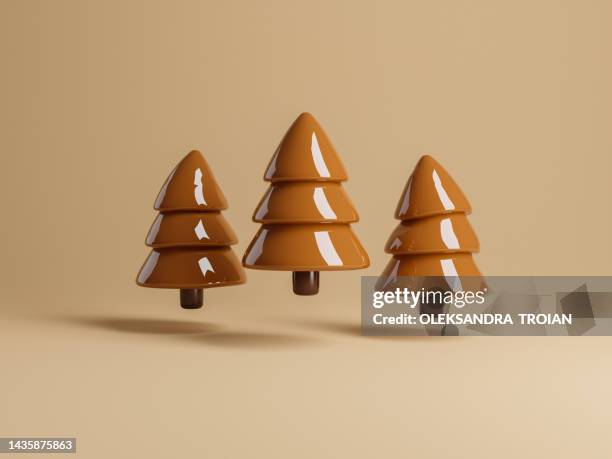 3d render of cartoon chocolate pine trees - christmas cake bildbanksfoton och bilder
