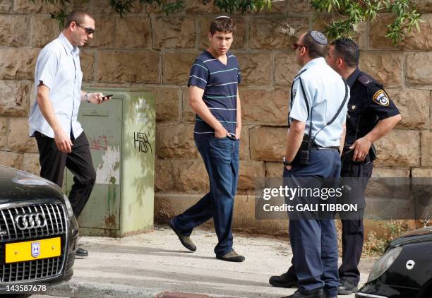 The Israeli Prime Minister's youngest son, Avner Netanyahu , walks outside the house of his grandfather, Benzion Netanyahu, on April 30, 2012 in...