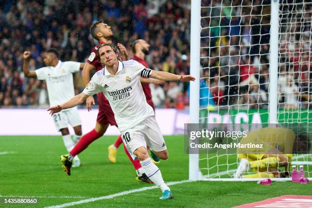 Luka Modric of Real Madrid celebrates after scoring the opening goal during the LaLiga Santander match between Real Madrid CF and Sevilla FC at...