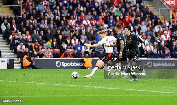 Stuart Armstrong of Southampton scores to make it 1-1 during the Premier League match between Southampton FC and Arsenal FC at St. Mary's Stadium on...