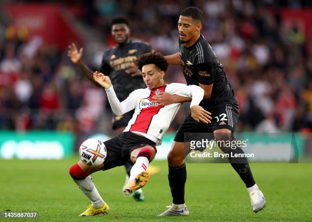 Mohammed Salisu of Southampton is challenged by William Saliba of Arsenal during the Premier League match between Southampton FC and Arsenal FC at...