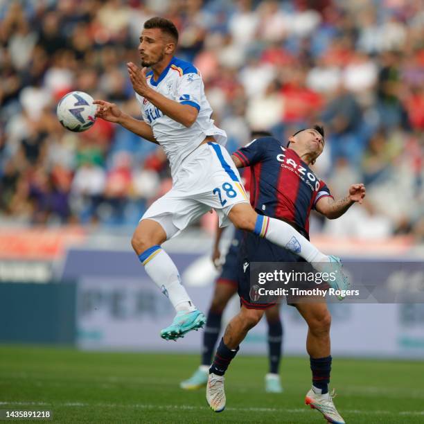 Remi Oudin of US Lecce and Gary Medel of Bologna FC during the Serie A match between Bologna FC and US Lecce at Stadio Renato Dall'Ara on October 23,...