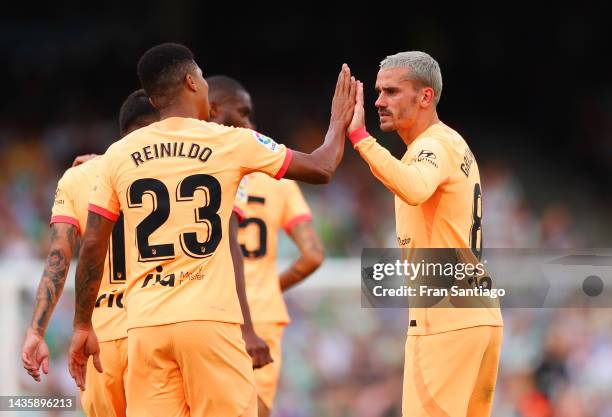 Antoine Griezmann of Atletico Madrid celebrates after scoring their team's first goal during the LaLiga Santander match between Real Betis and...