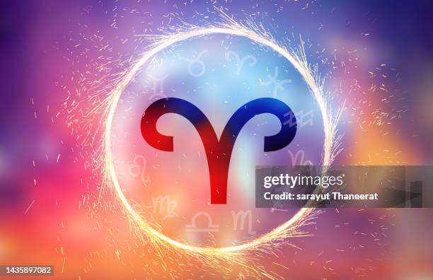 aries symbol on a colorful background light - carneiro imagens e fotografias de stock