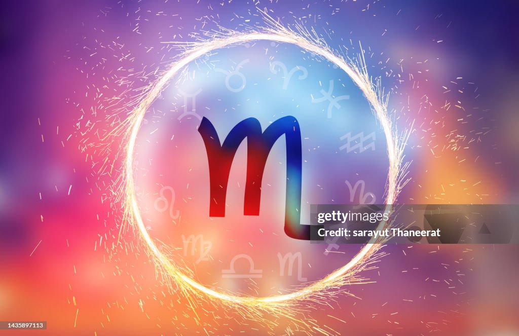 Scorpio symbol on a colorful background light
