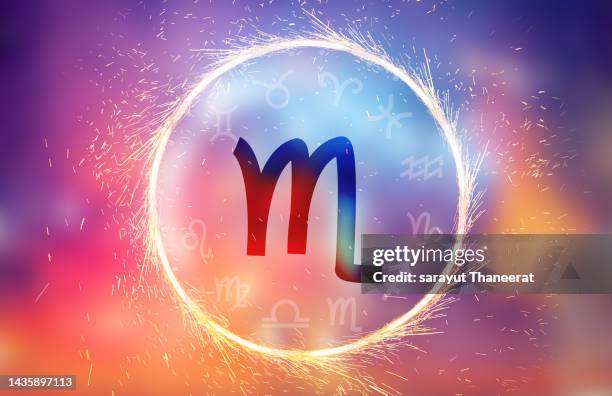 scorpio symbol on a colorful background light - horoscope signs stockfoto's en -beelden