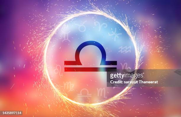 libra symbol on a colorful background light - symbol stock pictures, royalty-free photos & images