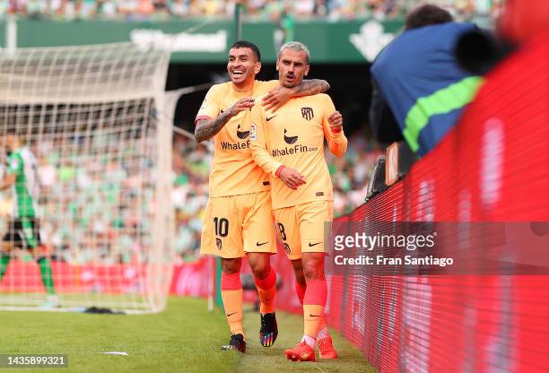 Antoine Griezmann celebrates with Angel Correa of Atletico Madrid after scoring their team's second goal during the LaLiga Santander match between...