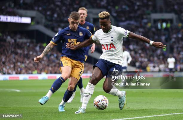 Kieran Trippier of Newcastle United challenges Ryan Sessegnon of Tottenham Hotspur during the Premier League match between Tottenham Hotspur and...