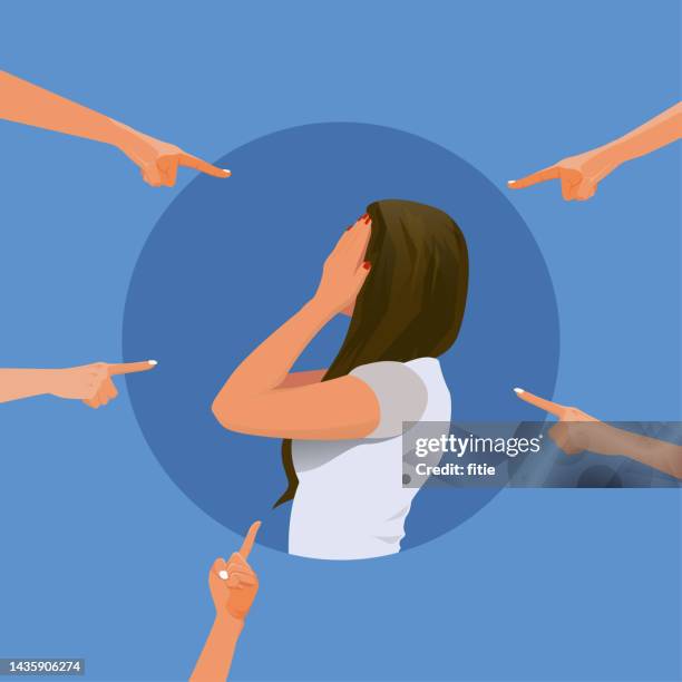 depressed girl cries and covers her face with her hands. female surrounded by the hands of her peers pointing at her. human character vector - threats stock illustrations