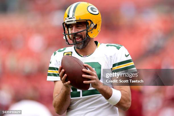 Aaron Rodgers of the Green Bay Packers looks on during warmups before the game against the Washington Commanders at FedExField on October 23, 2022 in...