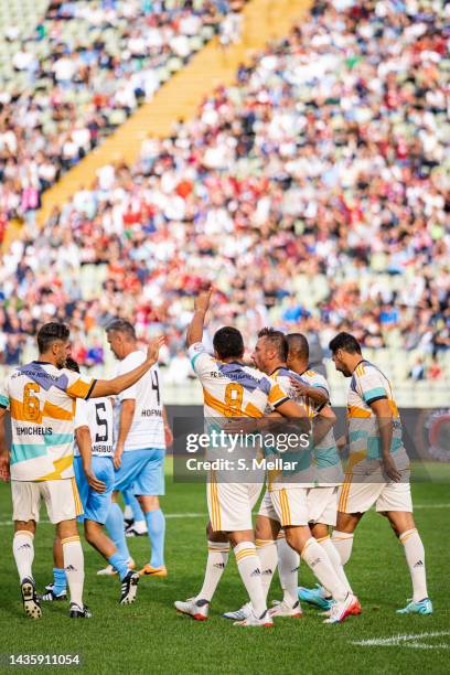 The Legends of FC Bayern Muenchen celebrate a goal during the match between FC Bayern München legends and TSV 1860 München legends as part of the...