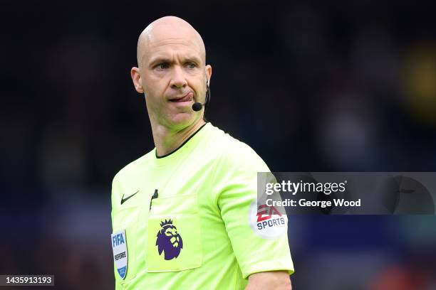 Referee, Anthony Taylor looks on during the Premier League match between Leeds United and Fulham FC at Elland Road on October 23, 2022 in Leeds,...