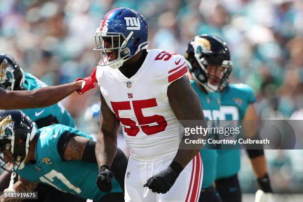 Jihad Ward of the New York Giants reacts after a tackle in the first quarter against the Jacksonville Jaguars at TIAA Bank Field on October 23, 2022...