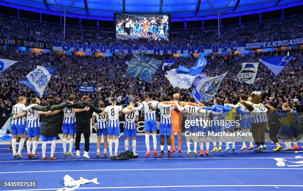 Hertha BSC players celebrate with the fans after their sides victory during the Bundesliga match between Hertha BSC and FC Schalke 04 at...