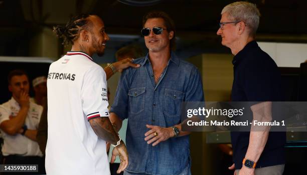Lewis Hamilton of Great Britain and Mercedes meets Brad Pitt and Tim Cook in the garage prior to the F1 Grand Prix of USA at Circuit of The Americas...