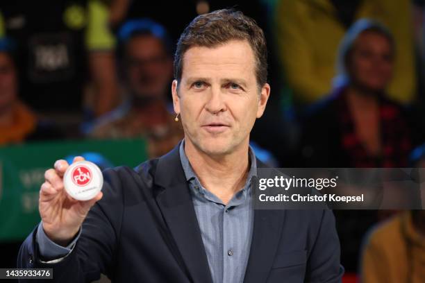 Oliver Bierhoff, Team Director of Germany presents the drawing match between 1. FC Nuernberg and Fortuna Duesseldorf during the DFB Cup Draw round of...