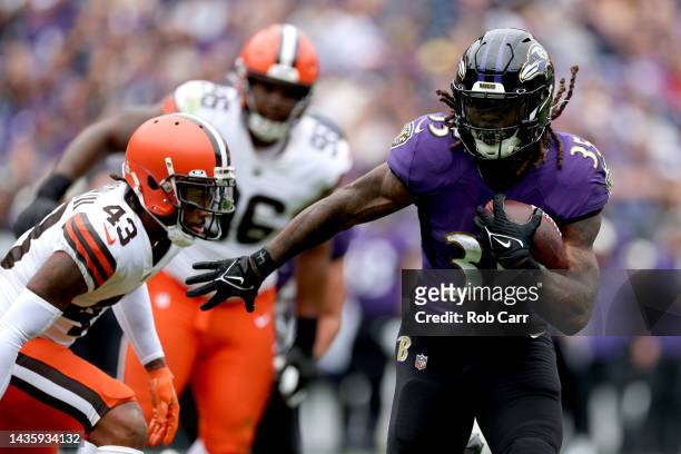 Gus Edwards of the Baltimore Ravens rushes forward for a touchdown during the second quarter of the game against the Cleveland Browns at M&T Bank...