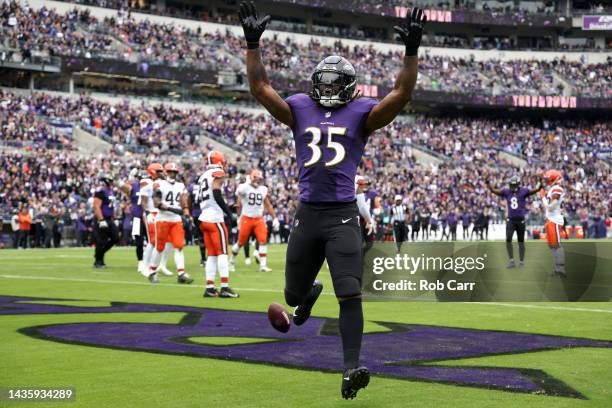 Gus Edwards of the Baltimore Ravens celebrates after scoring a touchdown during the second quarter of the game against the Cleveland Browns at M&T...