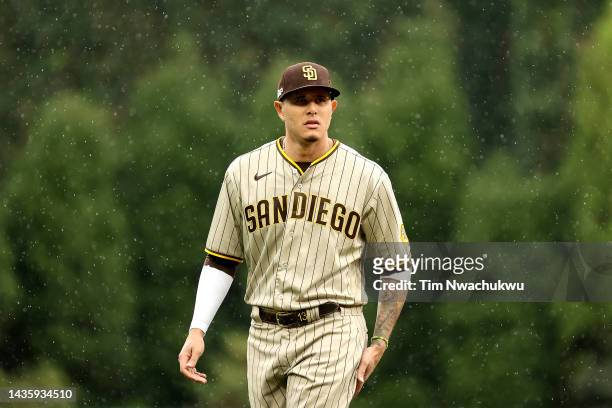Manny Machado of the San Diego Padres watches action prior to game five of the National League Championship Series against the Philadelphia Phillies...