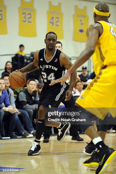 Flip Murray of the Austin Toros dribbles the ball against the Los Angeles D-Fenders at Toyota Sports Center during Game Three of the 2012 NBA...