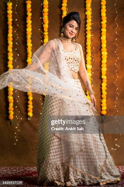 portrait of beautiful indian girl dressed in a traditional indian national suit, jewelry set, blouse and dupatta - blouse fashion stock pictures, royalty-free photos & images
