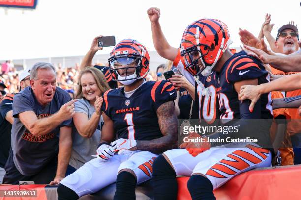 Ja'Marr Chase of the Cincinnati Bengals is congratulated by fans after scoring a touchdown against the Atlanta Falcons during the second quarter at...