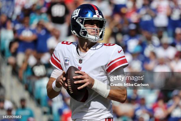 Daniel Jones of the New York Giants looks to pass in the second quarter against the Jacksonville Jaguars at TIAA Bank Field on October 23, 2022 in...