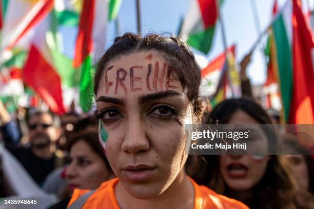 Protestors attend a rally organised by the "Women Life Freedom Collective" in solidarity with women and protesters in Iran on October 22, 2022 in...