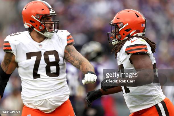Kareem Hunt of the Cleveland Browns celebrates with Jack Conklin after rushing for a touchdown during the fourth quarter of the game against the...