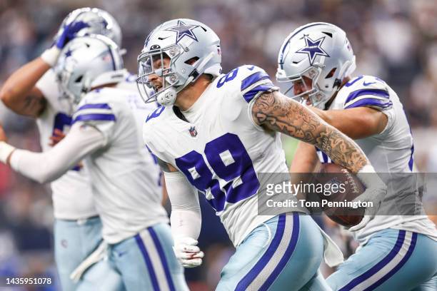 Peyton Hendershot of the Dallas Cowboys celebrates after making a touchdown against the Detroit Lions during the fourth quarter at AT&T Stadium on...