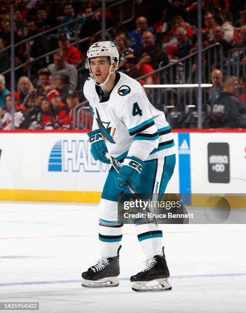 Scott Harrington of the San Jose Sharks skates against the New Jersey Devils at the Prudential Center on October 22, 2022 in Newark, New Jersey.